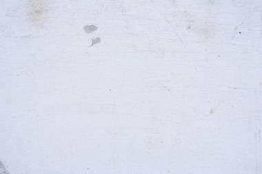 Doku, duvar, beton, arka plan olarak kullanılabilir. Çizik ve çatlaklarla dolu bir duvar parçası.