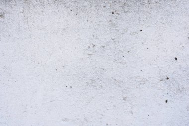 Doku, duvar, beton, arka plan olarak kullanılabilir. Çizik ve çatlaklarla dolu bir duvar parçası.