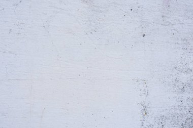 Doku, duvar, beton, arka plan olarak kullanılabilir. Çizik ve çatlaklarla dolu bir duvar parçası.