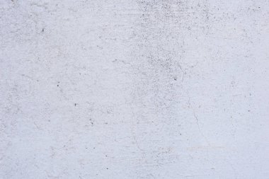 Doku, duvar, beton, arka plan olarak kullanılabilir. Çizik ve çatlaklarla dolu bir duvar parçası.