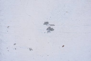 Doku, duvar, beton, arka plan olarak kullanılabilir. Çizik ve çatlaklarla dolu bir duvar parçası.