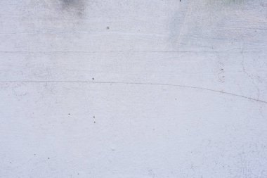 Doku, duvar, beton, arka plan olarak kullanılabilir. Çizik ve çatlaklarla dolu bir duvar parçası.