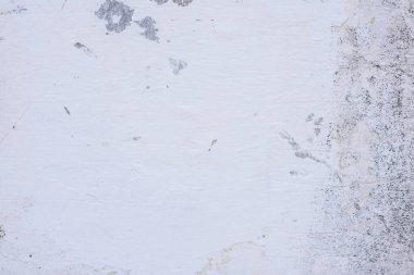 Doku, duvar, beton, arka plan olarak kullanılabilir. Çizik ve çatlaklarla dolu bir duvar parçası.