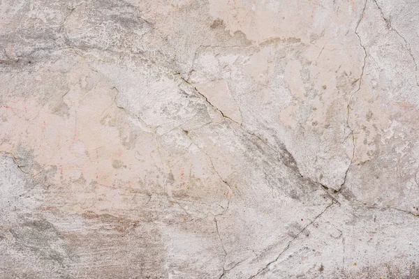 Doku, duvar, beton, arka plan olarak kullanılabilir. Çizik ve çatlaklarla dolu bir duvar parçası.
