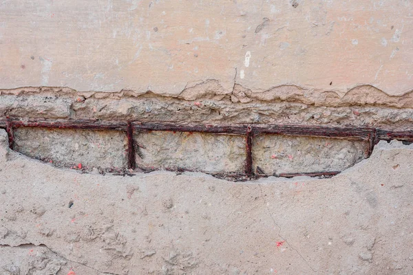 Doku, duvar, beton, arka plan olarak kullanılabilir. Çizik ve çatlaklarla dolu bir duvar parçası.