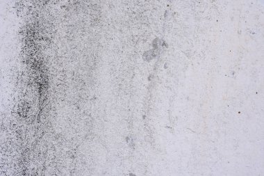 Doku, duvar, beton, arka plan olarak kullanılabilir. Çizik ve çatlaklarla dolu bir duvar parçası.