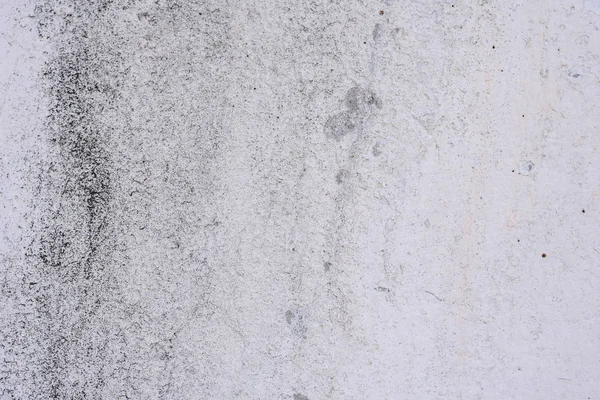 Doku, duvar, beton, arka plan olarak kullanılabilir. Çizik ve çatlaklarla dolu bir duvar parçası.