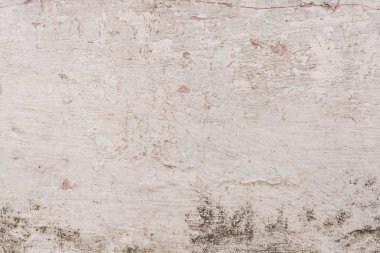 Doku, duvar, beton, arka plan olarak kullanılabilir. Çizik ve çatlaklarla dolu bir duvar parçası.