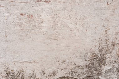 Doku, duvar, beton, arka plan olarak kullanılabilir. Çizik ve çatlaklarla dolu bir duvar parçası.