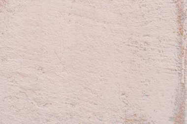 Doku, duvar, beton, arka plan olarak kullanılabilir. Çizik ve çatlaklarla dolu bir duvar parçası.