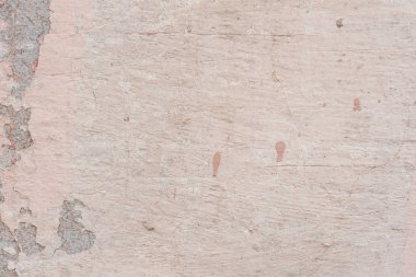Doku, duvar, beton, arka plan olarak kullanılabilir. Çizik ve çatlaklarla dolu bir duvar parçası.
