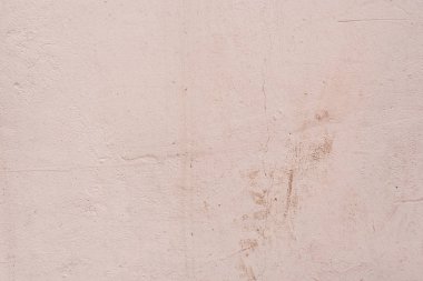 Doku, duvar, beton, arka plan olarak kullanılabilir. Çizik ve çatlaklarla dolu bir duvar parçası.