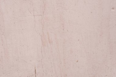 Doku, duvar, beton, arka plan olarak kullanılabilir. Çizik ve çatlaklarla dolu bir duvar parçası.