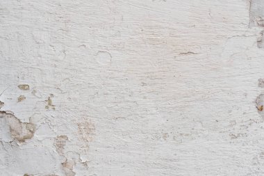 Doku, duvar, beton, arka plan olarak kullanılabilir. Çizik ve çatlaklarla dolu bir duvar parçası.