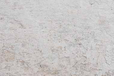 Doku, duvar, beton, arka plan olarak kullanılabilir. Çizik ve çatlaklarla dolu bir duvar parçası.