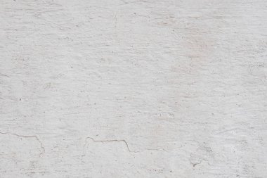 Doku, duvar, beton, arka plan olarak kullanılabilir. Çizik ve çatlaklarla dolu bir duvar parçası.