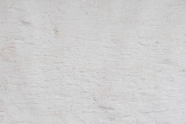 Doku, duvar, beton, arka plan olarak kullanılabilir. Çizik ve çatlaklarla dolu bir duvar parçası.