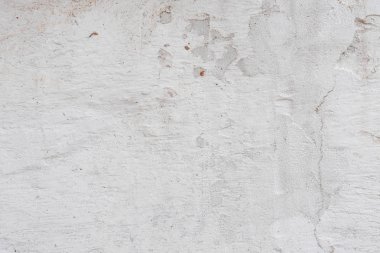 Doku, duvar, beton, arka plan olarak kullanılabilir. Çizik ve çatlaklarla dolu bir duvar parçası.