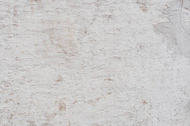 Doku, duvar, beton, arka plan olarak kullanılabilir. Çizik ve çatlaklarla dolu bir duvar parçası.