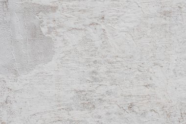 Doku, duvar, beton, arka plan olarak kullanılabilir. Çizik ve çatlaklarla dolu bir duvar parçası.
