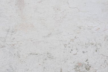 Doku, duvar, beton, arka plan olarak kullanılabilir. Çizik ve çatlaklarla dolu bir duvar parçası.