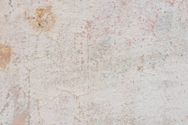 Doku, duvar, beton, arka plan olarak kullanılabilir. Çizik ve çatlaklarla dolu bir duvar parçası.