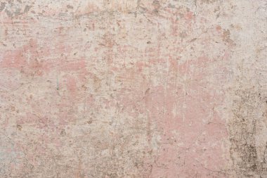 Doku, duvar, beton, arka plan olarak kullanılabilir. Çizik ve çatlaklarla dolu bir duvar parçası.