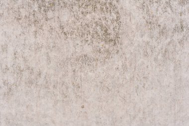 Doku, duvar, beton, arka plan olarak kullanılabilir. Çizik ve çatlaklarla dolu bir duvar parçası.