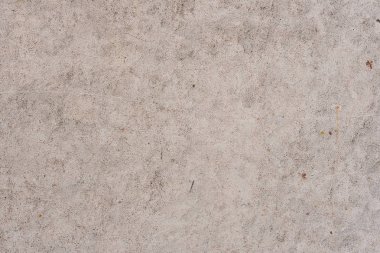 Doku, duvar, beton, arka plan olarak kullanılabilir. Çizik ve çatlaklarla dolu bir duvar parçası.