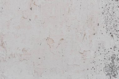 Doku, duvar, beton, arka plan olarak kullanılabilir. Çizik ve çatlaklarla dolu bir duvar parçası.