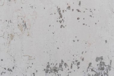 Doku, duvar, beton, arka plan olarak kullanılabilir. Çizik ve çatlaklarla dolu bir duvar parçası.