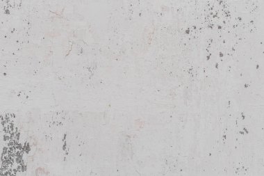 Doku, duvar, beton, arka plan olarak kullanılabilir. Çizik ve çatlaklarla dolu bir duvar parçası.