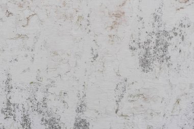 Doku, duvar, beton, arka plan olarak kullanılabilir. Çizik ve çatlaklarla dolu bir duvar parçası.