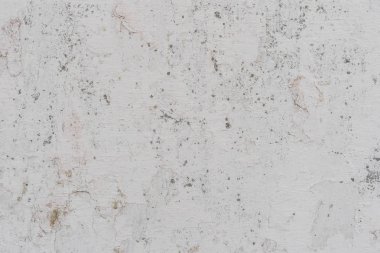 Doku, duvar, beton, arka plan olarak kullanılabilir. Çizik ve çatlaklarla dolu bir duvar parçası.