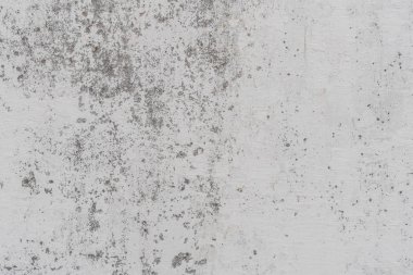 Doku, duvar, beton, arka plan olarak kullanılabilir. Çizik ve çatlaklarla dolu bir duvar parçası.
