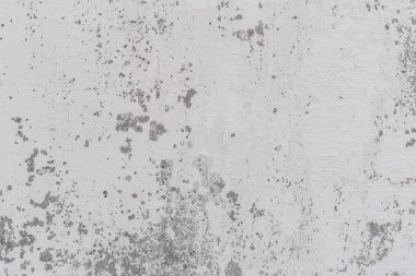 Doku, duvar, beton, arka plan olarak kullanılabilir. Çizik ve çatlaklarla dolu bir duvar parçası.