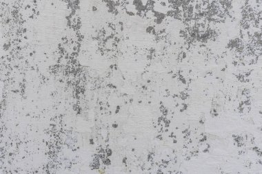 Doku, duvar, beton, arka plan olarak kullanılabilir. Çizik ve çatlaklarla dolu bir duvar parçası.