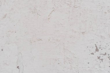 Doku, duvar, beton, arka plan olarak kullanılabilir. Çizik ve çatlaklarla dolu bir duvar parçası.