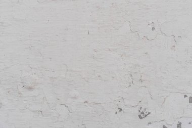 Doku, duvar, beton, arka plan olarak kullanılabilir. Çizik ve çatlaklarla dolu bir duvar parçası.