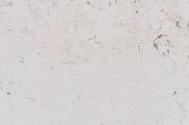 Doku, duvar, beton, arka plan olarak kullanılabilir. Çizik ve çatlaklarla dolu bir duvar parçası.