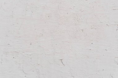 Doku, duvar, beton, arka plan olarak kullanılabilir. Çizik ve çatlaklarla dolu bir duvar parçası.