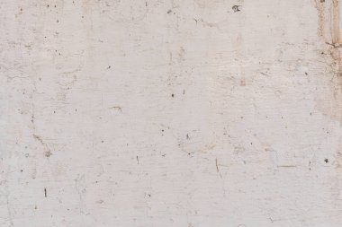 Doku, duvar, beton, arka plan olarak kullanılabilir. Çizik ve çatlaklarla dolu bir duvar parçası.