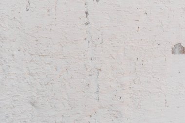 Doku, duvar, beton, arka plan olarak kullanılabilir. Çizik ve çatlaklarla dolu bir duvar parçası.