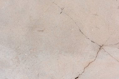 Doku, duvar, beton, arka plan olarak kullanılabilir. Çizik ve çatlaklarla dolu bir duvar parçası.