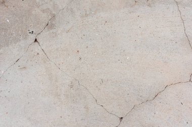 Doku, duvar, beton, arka plan olarak kullanılabilir. Çizik ve çatlaklarla dolu bir duvar parçası.