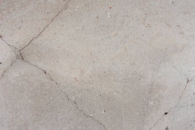 Doku, duvar, beton, arka plan olarak kullanılabilir. Çizik ve çatlaklarla dolu bir duvar parçası.