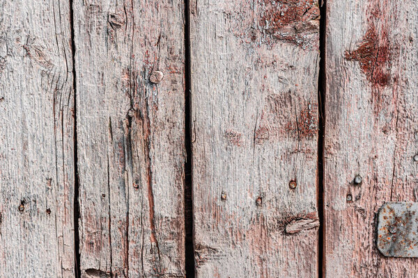 Текстура, дерево, стена, ее можно использовать в качестве фона. Деревянная текстура с царапинами и трещинами