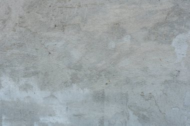 Doku, duvar, beton, arka plan olarak kullanılabilir. Çizik ve çatlaklarla dolu bir duvar parçası.
