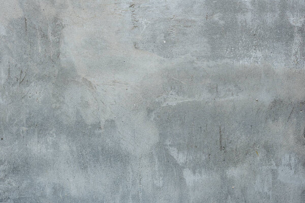 Текстура, стена, бетон, его можно использовать в качестве фона. Фрагмент стены с царапинами и трещинами