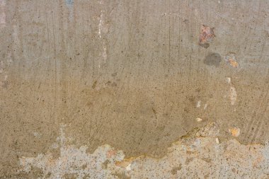 Doku, duvar, beton, arka plan olarak kullanılabilir. Çizik ve çatlaklarla dolu bir duvar parçası.